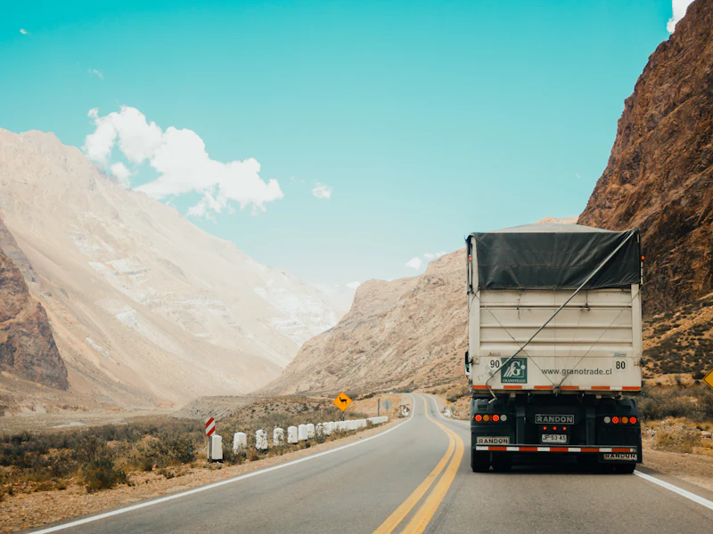 Truck driving along a mountain road