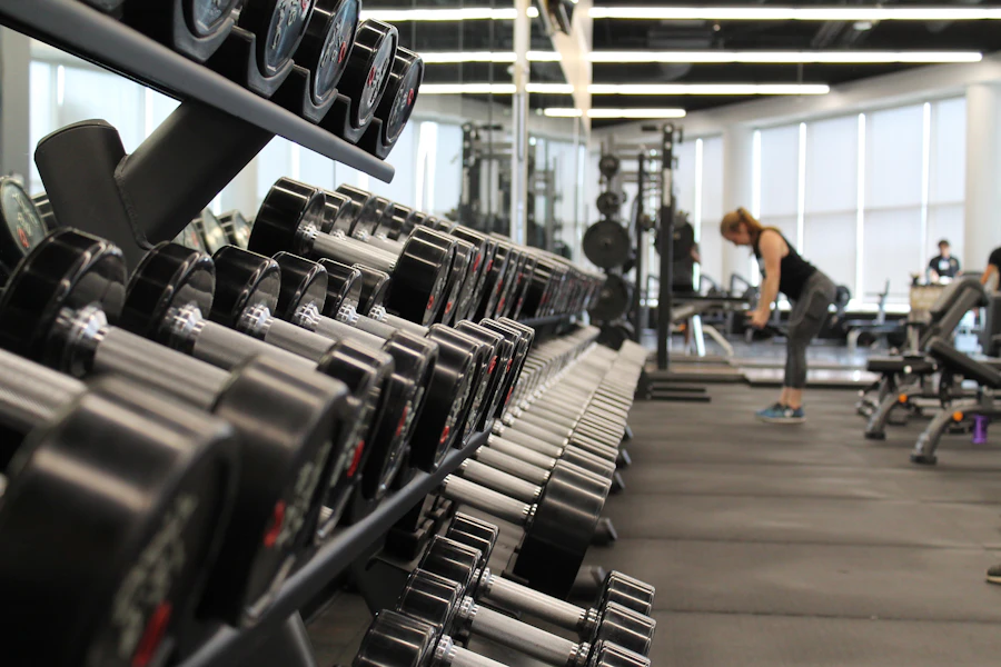 Bright fitness studio with free weights