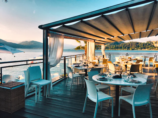 Covered terrace set for evening service
