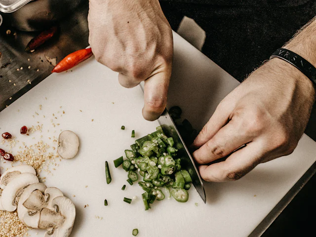 Chef preparing fresh ingredients in the kitchen