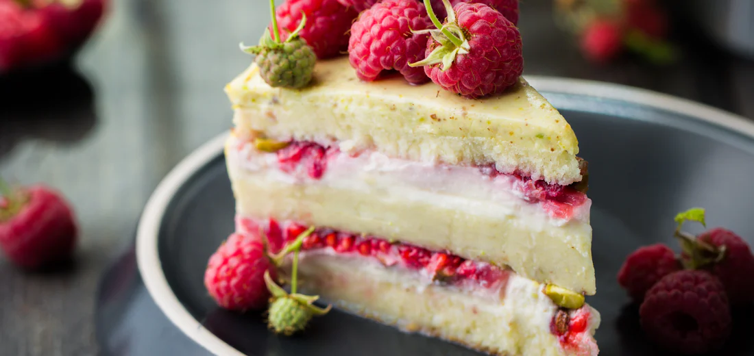 Layered raspberry cake with fresh berries